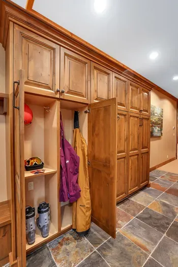 Come in off the snow, hang helmets and layers, rack the skis, and move easily from mudroom to the rest of the lodge