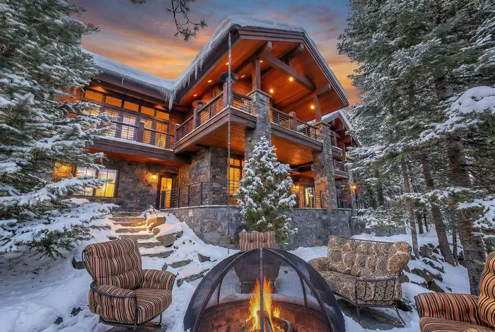 Welcome to The Heritage Lodge in Tamarack Resort—your new family ski tradition. Perched at tree-top level, this alpine sanctuary pairs timber and stone, crackling fires, and floor-to-ceiling views with spaces made for gathering.