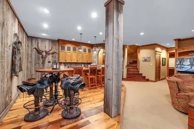 Saddle up partner! Stone, leather, and low light set the mood for conversations that run long and finish smooth