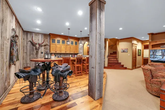 Saddle up partner! Stone, leather, and low light set the mood for conversations that run long and finish smooth