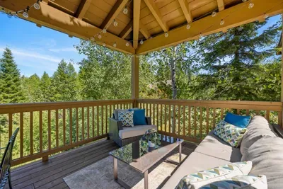 The covered upper deck is the perfect space for relaxing and enjoying the outdoors