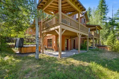 View of the expansive wraparound deck and private hot tub