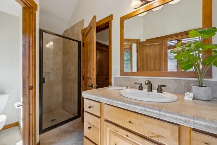 The primary ensuite has a large soaker tub as well as a stand-up shower