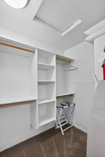 A walk‑in closet keeps your ski gear, hiking layers, and lake clothes organized during your stay.