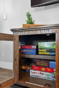 A huge stash of board games brings screen‑free fun to snowy nights and rainy afternoons.