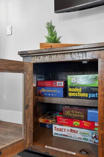 A huge stash of board games brings screen‑free fun to snowy nights and rainy afternoons.