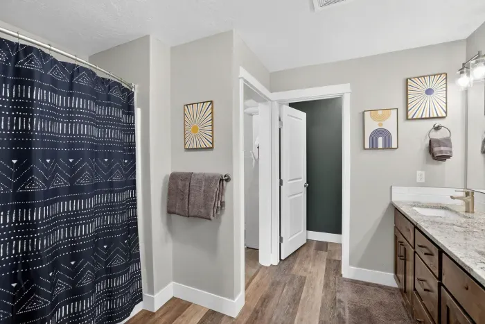 Soak in the tub or rinse off a day of sunscreen and snow in the shower/tub combo primary bath.