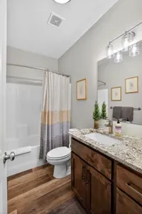 Fresh towels, a convenient tub/shower combo, and simple modern finishes in the 2nd level full bath