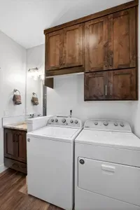 Drop your gear in the garage, toss clothes straight into the washer, and rinse off in the convenient main‑level bathroom
