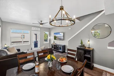 The main level flows easily from kitchen to dining to living—ideal for groups and families