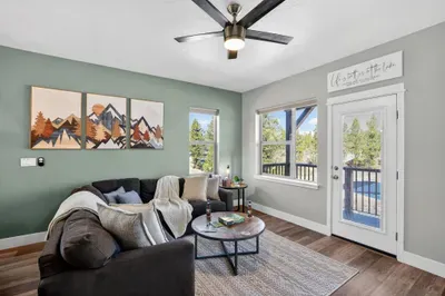 Natural light pours into the main level, giving the townhome an airy, mountain‑modern feel. Open up the balcony doors for fresh mountain air
