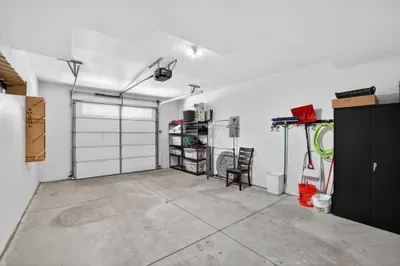 This gear‑friendly attached garage keeps skis, boards, bikes, and SUPs organized and out of the way.