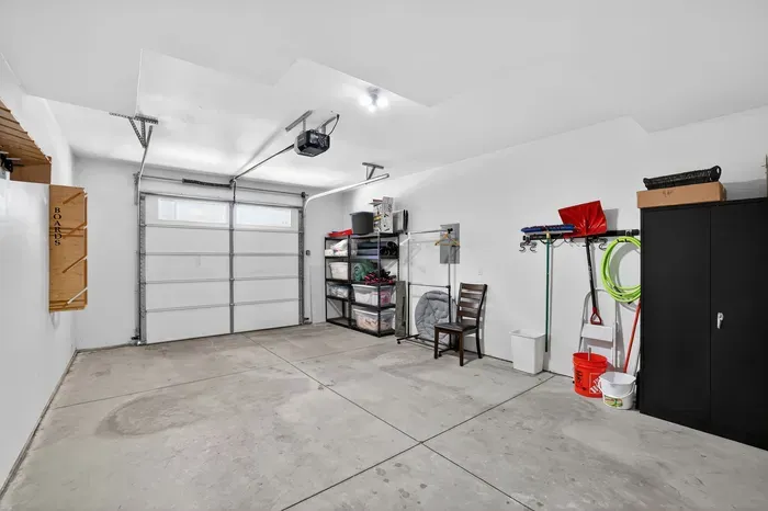 This gear‑friendly attached garage keeps skis, boards, bikes, and SUPs organized and out of the way.