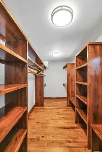 An oversized walk‑in closet turns the primary suite into a true retreat—plenty of room to unpack fully, stash ski gear and bags out of sight, and keep the space feeling calm, clean, and uncluttered for your whole stay.