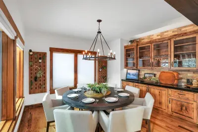 The dining table seats eight comfortably—perfect for slow dinners, card games, and trip‑planning sessions that stretch into the night.
