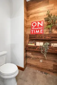 Benefit from the thoughtful design of two separate toilet closets, ensuring privacy and comfort in the expansive primary bathroom.