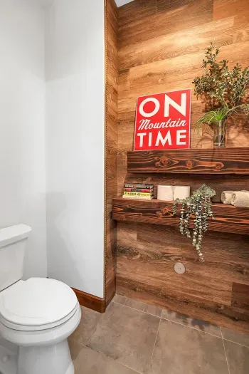 Benefit from the thoughtful design of two separate toilet closets, ensuring privacy and comfort in the expansive primary bathroom.