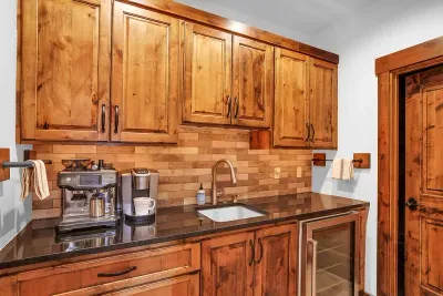 Butler’s pantry built for early risers and coffee people: Keurig, Breville espresso, and room to stash everyone’s favorites.