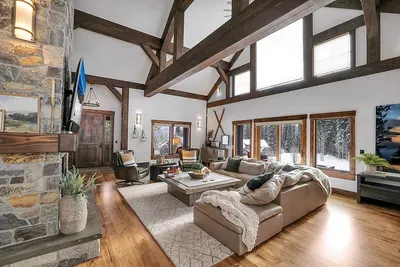 Boots by the door, fire on, something good on the 65" Smart TV—this is your landing zone between first tracks and sleep.