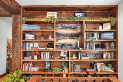 Morning reading nook, afternoon work spot, or evening game room—the library flexes to whatever your day needs.