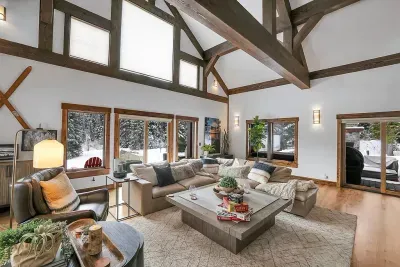Modern mountain without the museum vibe: soft textures, clean lines, and room for the whole crew to spread out.