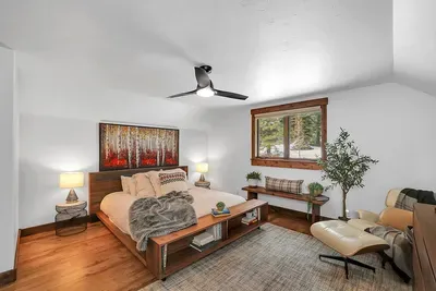Paired with the adjacent loft lounge, this bedroom becomes a relaxed mini suite for a couple, teen, or small family.