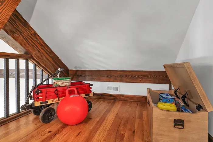 The loft's children's nook is a whimsical haven, complete with toys and games that spark creativity and fun for kids of all ages.
