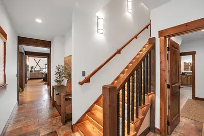 Head upstairs to the cozy loft, where you'll find a welcoming bedroom, a full bathroom, and a snug living space complete with a gas fireplace and a charming children's nook. Perfect for family relaxation and adventure.