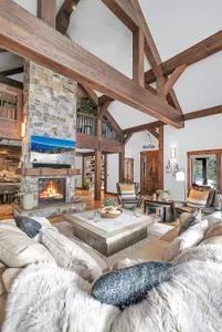 Designed for real downtime: deep, comfortable seating, layered lighting, and views that pull the mountains right into the room.