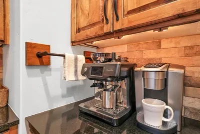 Butler’s pantry built for early risers and coffee snobs—Keurig, Breville espresso, and everything you need for slow mornings in. We provide Lavazza ground coffee and K-Cups