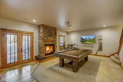 Crack a rack, pour a drink, and cue up the playlist. Hot tub access through the patio doors