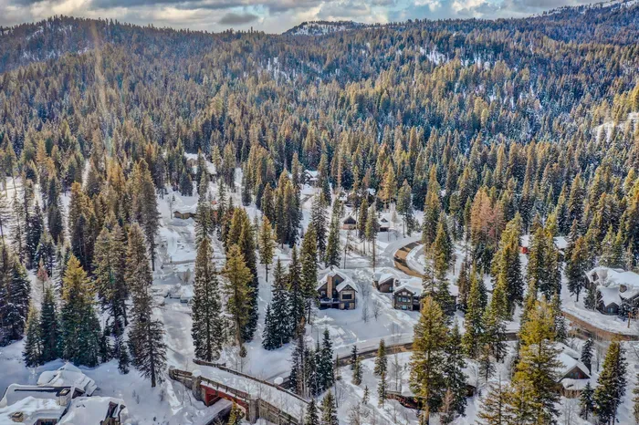 Half an acre of elbow room, with pines, peaks, and trails all around.