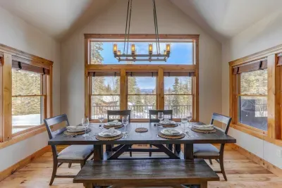 Dinner tastes better with trees, sky, and lake peeking through the windows