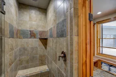 Main floor full bath--tiled, spacious, effortless cozy and convenient