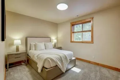 Queen rooms downstairs give friends and older kids their own zone
