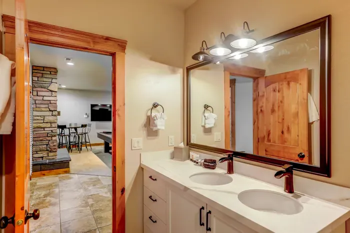 Daylight basement bathroom, with double-vanity and walk-in shower