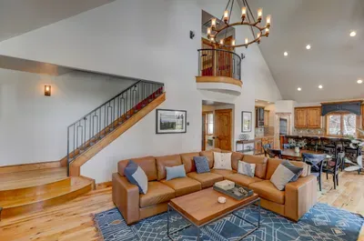 Vaulted ceilings, wraparound windows, and that soft mountain light.