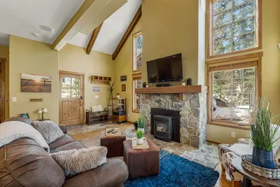 Whether it's game night or a cozy dinner, Terrapin Station's living room is the heart of your mountain retreat