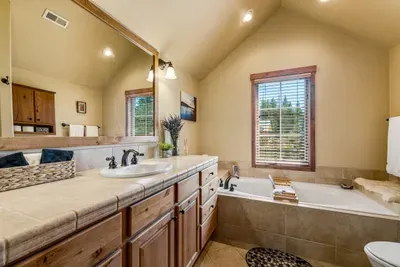 Step into your king suite bathroom and unwind in the large soaking tub, complete with stunning views that make every bath a mini getaway