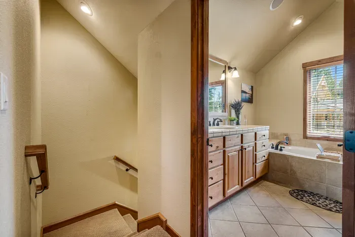 Conveniently located on the 2nd floor across from the primary bedroom, this bathroom is designed for ultimate relaxation