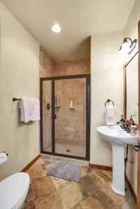 Thoughtful Design: With strategically placed storage and a well-equipped full bath on the main floor, Alpine Escape ensures both convenience and comfort during your mountain retreat