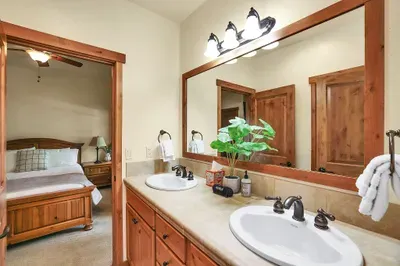 Spacious Comfort: With ample space and dual sinks, this bathroom is designed for comfort and efficiency, ensuring guests can enjoy a seamless and pleasant experience