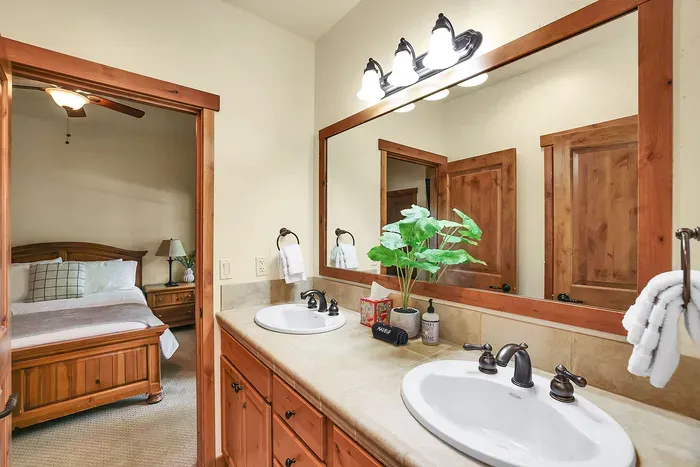 Spacious Comfort: With ample space and dual sinks, this bathroom is designed for comfort and efficiency, ensuring guests can enjoy a seamless and pleasant experience