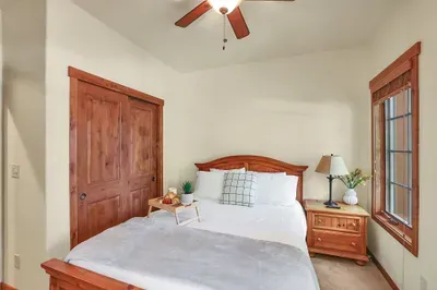 Entertainment Ready: Equipped with a smart TV, the queen guest bedroom allows you to relax and enjoy your favorite shows in the comfort of your own private space