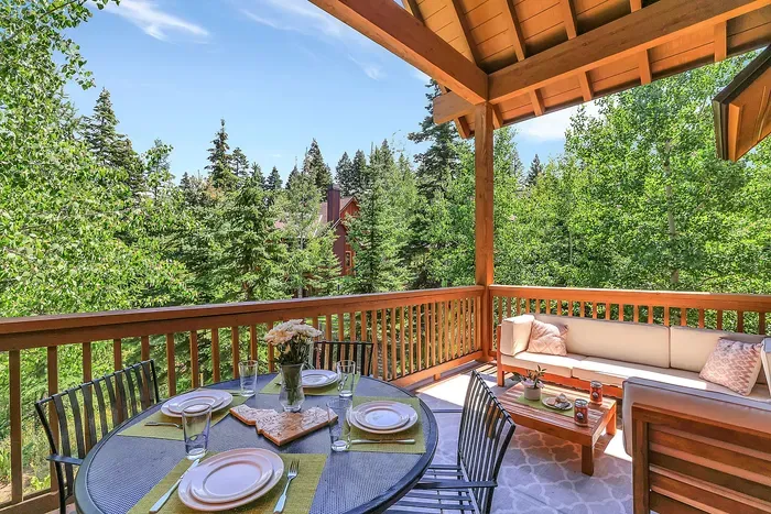 Step onto the balcony from the main living area and immerse yourself in the tranquil beauty of the surrounding forest, perfect for morning coffee or evening relaxation