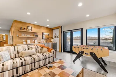 Seamless indoor/outdoor living. The daylight basement offers direct access to the patio and lake