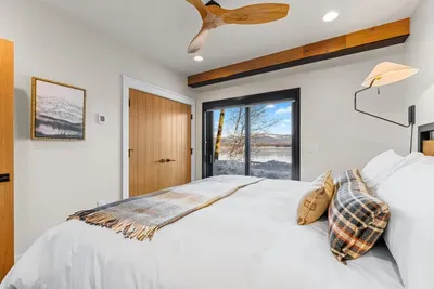 Clean, modern lines with warm textures keep things cozy but elevated
