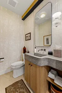 Enjoy the convenience and elegance of a powder room on the main floor