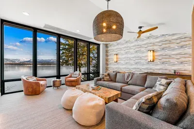 Movie night upstairs, card game downstairs, quiet reading in between--lake views for everyone