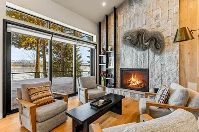 Gas fireplace, lake views, and plenty of space to spread out after a full day outside.